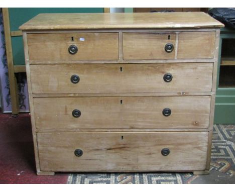 A Victorian stripped pine bedroom chest of two short over three long graduated drawers, 110cm wide x 50cm deep x 92cm high to