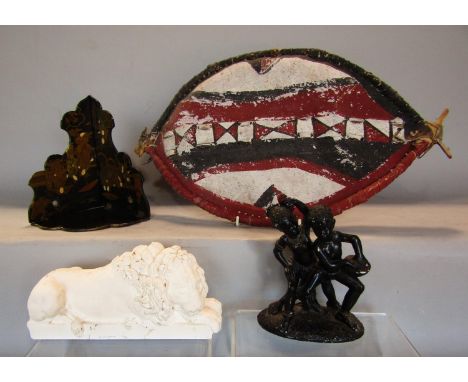A Japanese lacquered chinoiserie corner bracket with gilt chinoiserie overlay of figures in exterior settings, 19cm high, tog