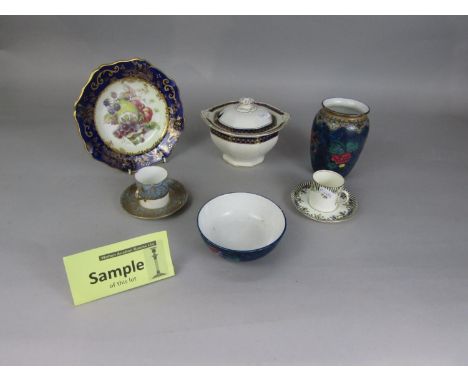 A collection of ceramics including Burleigh ware dinner wares with blue and gilt border decoration including tureens and cove