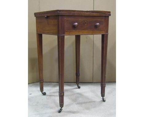 A small Georgian mahogany fold over top card table, square when closed (45 cm) approx, over a single frieze drawer and raised