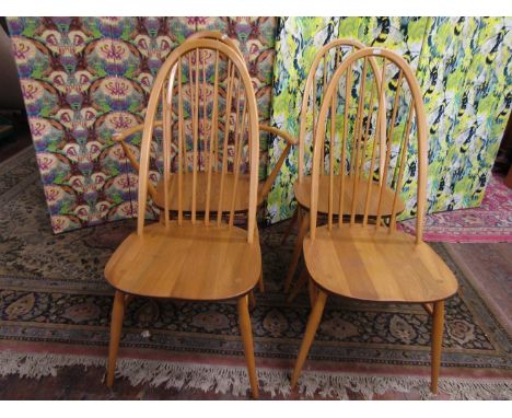 Set of four Ercol light elm high back Windsor chairs in elm, to include one caver (4) 