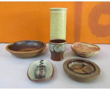 Margaret Leach - Collection of studio pottery to include five slip ware dishes (one af) and a further cylinder stoneware vase