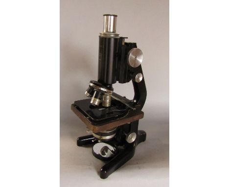 A Watson Barnet microscope, model number Service II, number 124081, in black enamel and chrome 