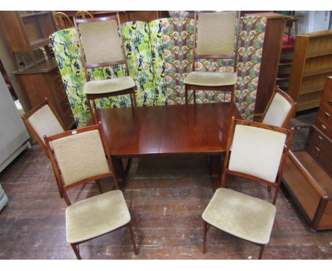 Spottrup Danish rosewood extending dining table and six chairs, the table with two extra leaves, rose wood crossbanding and b