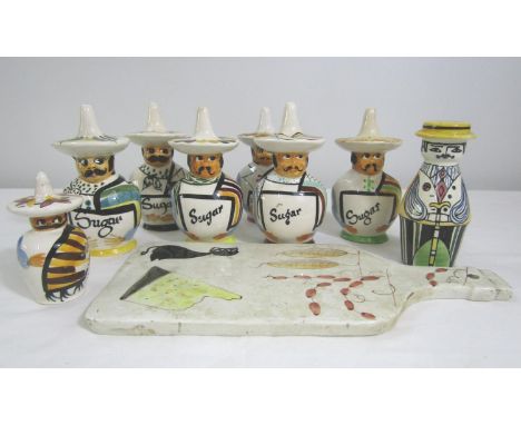 Seven various novelty ceramic casters in the form of men wearing sombreros, together with a further barber shop type caster a