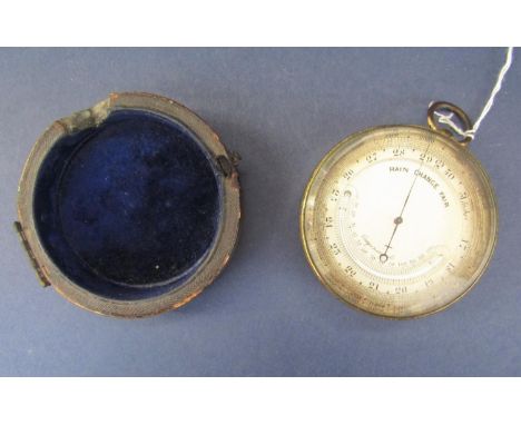 A compensated travelling barometer with brass case and silvered dial and incomplete leather casework 