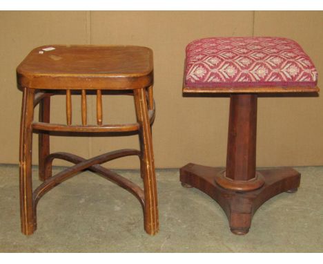 A Victorian mahogany piano/music stool with swivel adjustable square upholstered seat raised on an octagonal pillar, tricorn 