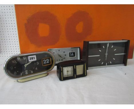 Two retro flip date clocks together with a further Bradley musical alarm clock and a further Smith's alarm clock (4) 
