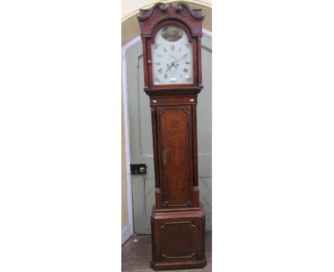 A Georgian oak longcase clock, the hood with swan neck pediment enclosing a broken arch and painted dial with calendar and se