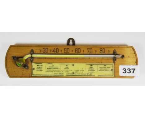 A vintage wine cellar thermometer, L. 25cm.