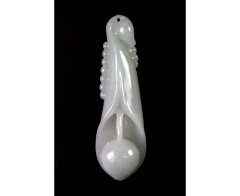 A very fine Chinese carved jade amulet of a lily flower, l. 6cm.