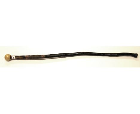 An interesting gentlemans walking cane with an inset compass, l. 93cm.