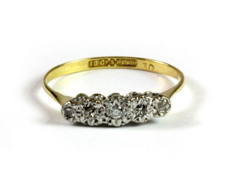 An 18ct yellow gold and platinum five diamond set ring, (M.5).