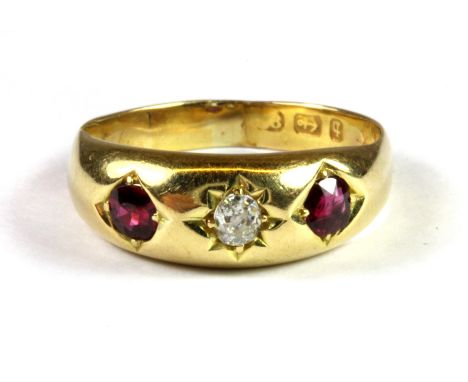 An antique 18ct yellow gold diamond and ruby set gipsy ring, (N.5).