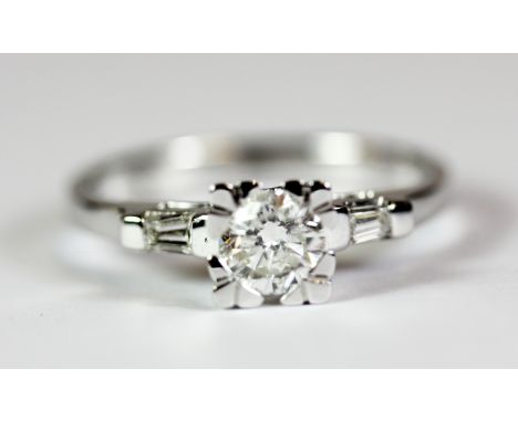 An 18ct white gold ring set with a brilliant cut solitaire diamond approx 0.5ct. Ring size N.5