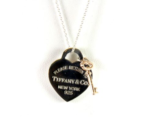 A Tiffany & Co 925 silver heart shaped pendant and chain.