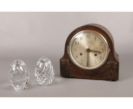 A Mahogany mantle clock &amp; two glass paperweights.  