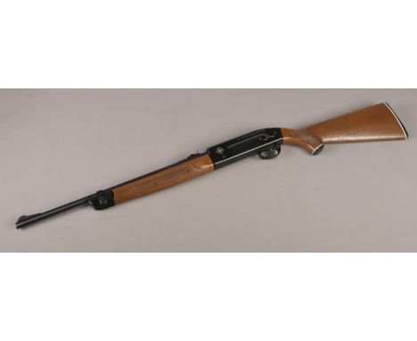 A Crosman 2100 Classic .177 cal pellet/BB Repeater air rifle. CAN'T POST THIS ITEM.  This gun cocks and fires.