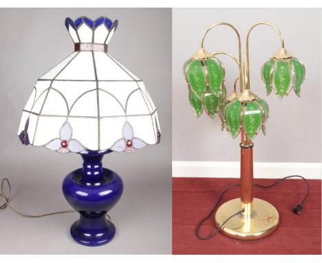 A blue ground ceramic table lamp with large tiffany style lamp shade (70cm) along with a decorative standard lamp (95cm).  