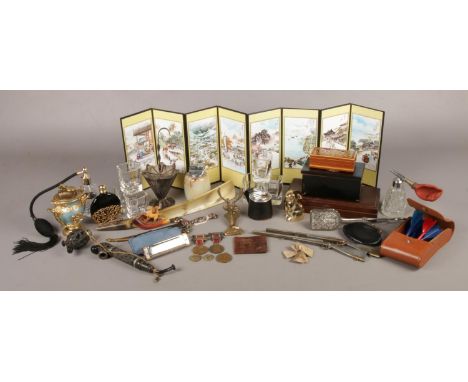 A large array of collectables. To include Horner harmonica, onyx lighter, a small series of boxes and small oriental folding 