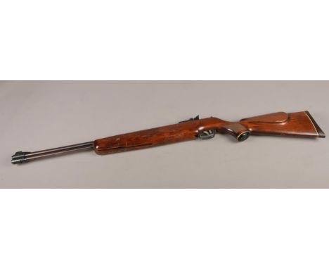 A .22cal H. Weihrauch Sport Waffen 77K under lever air rifle. Made in West Germany. CAN'T POST THIS ITEM.  This gun cocks and