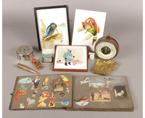 An assembly of collectables. To include a trio of hand painted ceramic tiles, boxed Callibri lighter, barometer and vintage s