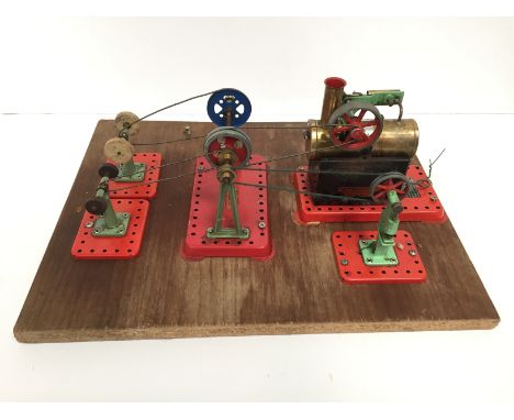 A vintage MAMOD Workstation on a wooden Base comprising a Mamod SP1 Horizontal Boiler and 4 Accessories - Hammer Press, Grind