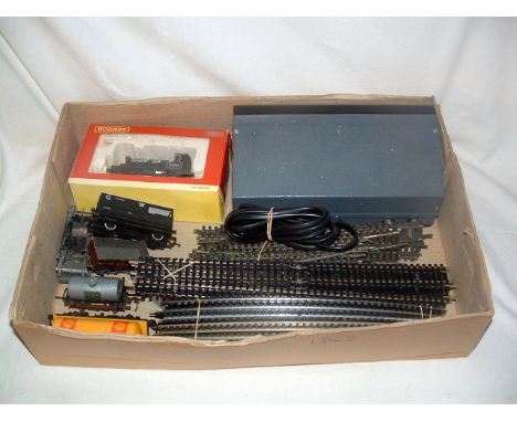 A tray containing a R782 BR Black 0-4-0ST 'Smokey Joe' (Good in a Fair Plus Box with Instructions), 6 x Goods Wagons by vario