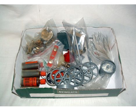A useful tray of MAMOD and WILESCO spares/accessories including Pistons, Wheels, Oil, various Drive Bands, 2 x Packs of Mamod