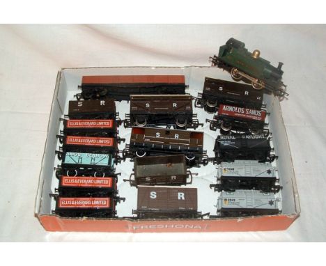 A tray containing a HORNBY R077 GWR Green 0-4-0T (Fair Plus) and 16 x Goods Wagons by various makers (Good)