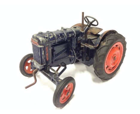Chad Valley Fordson Major Tractor, dark blue with orange hubs. Playworn, unboxed. 