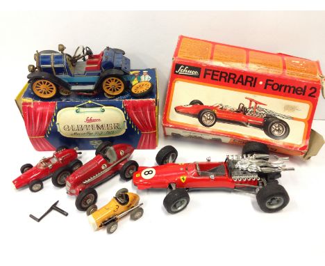 Four Schuco (Germany) Racing Cars: 1073 Ferrari Formel 2, l.25cm (G with crushed box); 1040/1 Micro Racer Ferrari; 1050 Studi