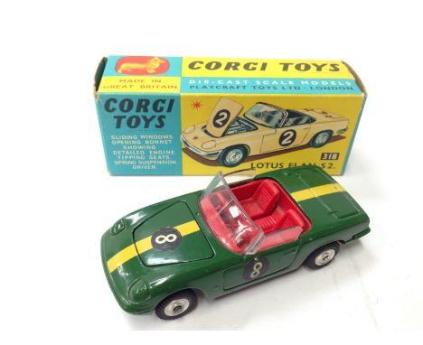 Corgi Toys 318 Lotus Elan S2, dark green with yellow stripe and RN '8'. VG in VG box with price in pen to one end flap. 