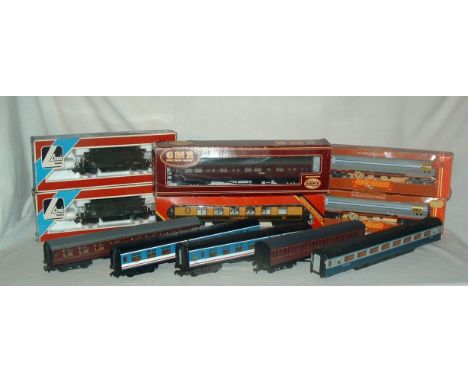 A tray containing 11 x Wagons and Coaches - LIMA 2 x 306665 Seacows - HORNBY R144 2 x Jet 100T Bogie Tankers and R229 Pullman