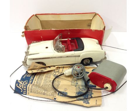 Schuco (Germany) 5308 Elektro Control Car: tinplate Mercedes 220S Open-Top in cream with red plastic interior, steering wheel