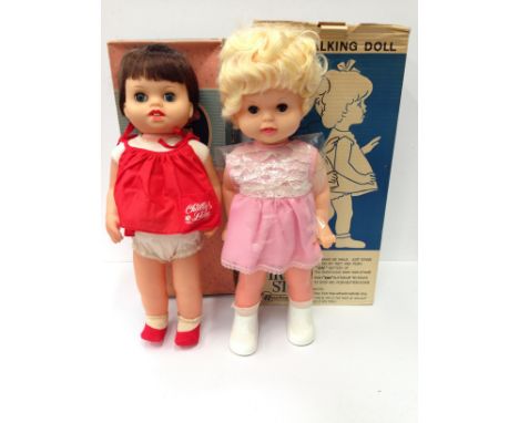 Two Rosebud (England) dolls: Baby First Step, battery operated walking doll with spare outfit and leaflet, height 45cm (E in 