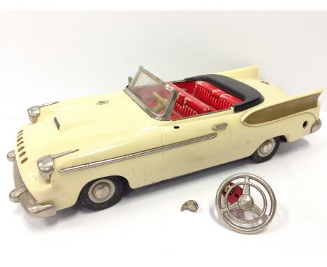 Schuco (Germany) 5700 Elektro Synchromatic Packard Open-Top car in cream with red tinprinted interior and dashboard, plated f