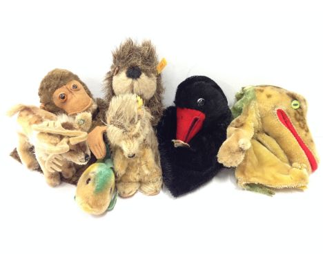 Selection of Steiff (Germany) animals, includes Hucky hand puppet. Overall well-loved, four with original Steiff button. (7)