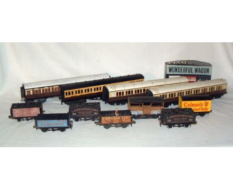 A tray containing 4 x GWR Coaches (Fair Plus) and 7 x Goods wagons (Good) made from various Kits. An unmade Peco Wonderful Wa