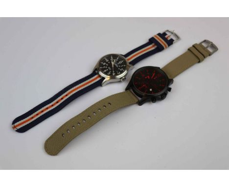 Gents Stainless Steel Timex Expedition Indiglo wristwatch and an AVI-8 Hawker Harrier II example, both Military style with Ca