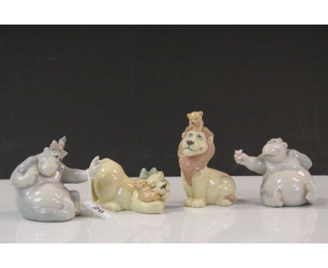 Four Nao Cartoon style ceramic Animal figurines, the tallest being approx 13cm