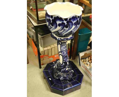 Vintage Flow Blue type ceramic two piece Jardiniere modelled as a Dolphin on a heavy Octagonal Blue Tile base, stands approx 