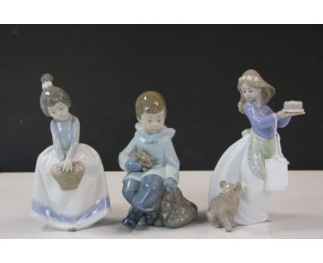 Three Nao ceramic Figurines to include; Boy with Basket, Girl with Cake &amp; Boy with Rabbit