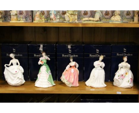 Five boxed Royal Doulton ceramic figurines to include HN2736 Tracy, HN3096 Merry Christmas, HN2835 Fair Lady, HN2477 Denise &