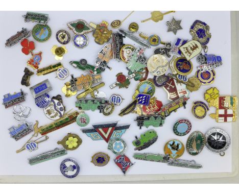 A collection of enamel badges