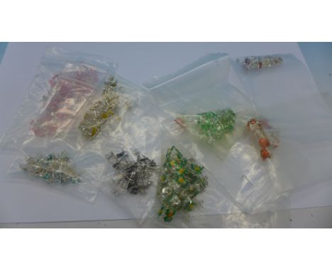 Over 100 pairs of 925 silver/enamel earrings, all unused