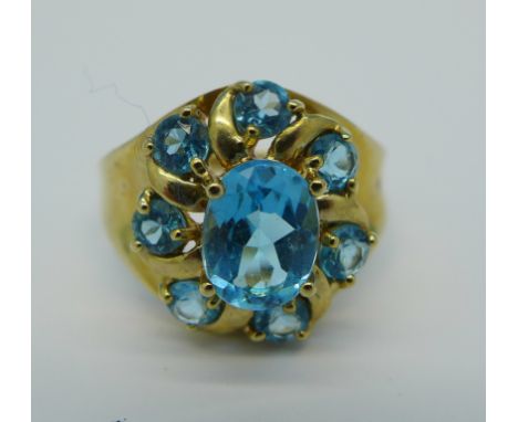 A 9ct gold and topaz ring, 3.8g, R