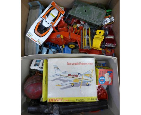 A collection of die-cast model vehicles including a Dinky Toys Beechcraft Baron, a/f, model soldiers, a Capt. Cutlass toy gun