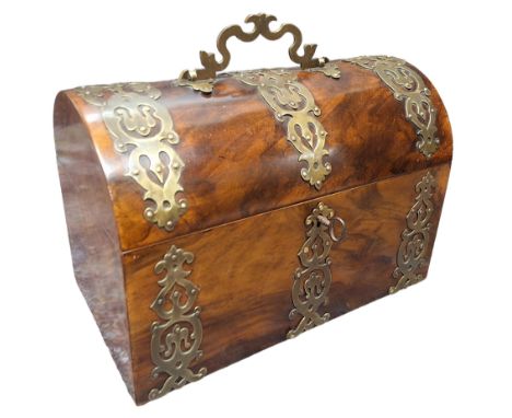 A Victorian burr walnut domed rectangular tea caddy, the cover and front applied with pierced and engraved cut card work, the