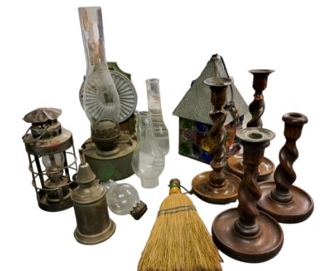 A pair of early 20th century oak barley twist candlesticks, 25cm high, c.1920;&nbsp; others, 20cm high;&nbsp; &nbsp;a coloure